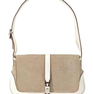 Gucci Jackie shoulder bag. This bag is crafted from beige canvas